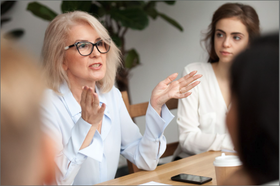 Woman talking with her hands out